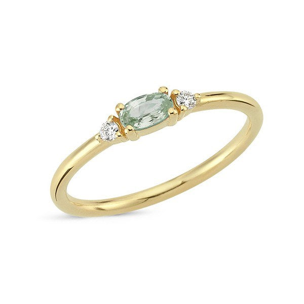 Petit ring i 14 karat guld med oval grøn safir og diamanter – Nuran